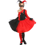 Girl wearing a red and black jester Halloween costume with one-shoulder bodice, pom-pom trim, tulle skirt and black eye mask - view 4